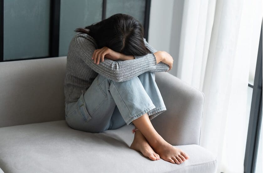 A woman feeling chronic stress